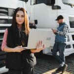 Truck driving on optimized route tracked in real-time using advanced truck dispatch software for efficient U.S. logistics operations
